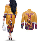 custom-brisbane-lions-football-christmas-couples-matching-off-the-shoulder-long-sleeve-dress-and-long-sleeve-button-shirt-merry-xmas-2023-mix-aboriginal-art