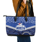 custom-north-melbourne-football-christmas-leather-tote-bag-merry-xmas-2023-mix-aboriginal-art
