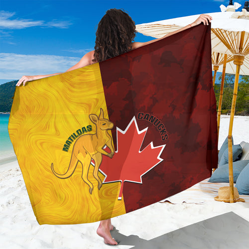 australia-and-canada-soccer-sarong-matildas-combine-canucks-together