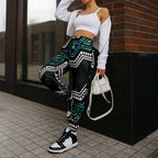 Taniko Aotearoa Mix Paua Shell Jogger Pants Niho Taniwha Turquoise Glitter - Aussie Hoodie