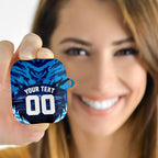 Personalised Geelong Cat Football AirPods Case Electric Blue Mascot Charging Cityscape