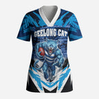Personalised Geelong Cat Football Scrub Top Electric Blue Mascot Charging Cityscape