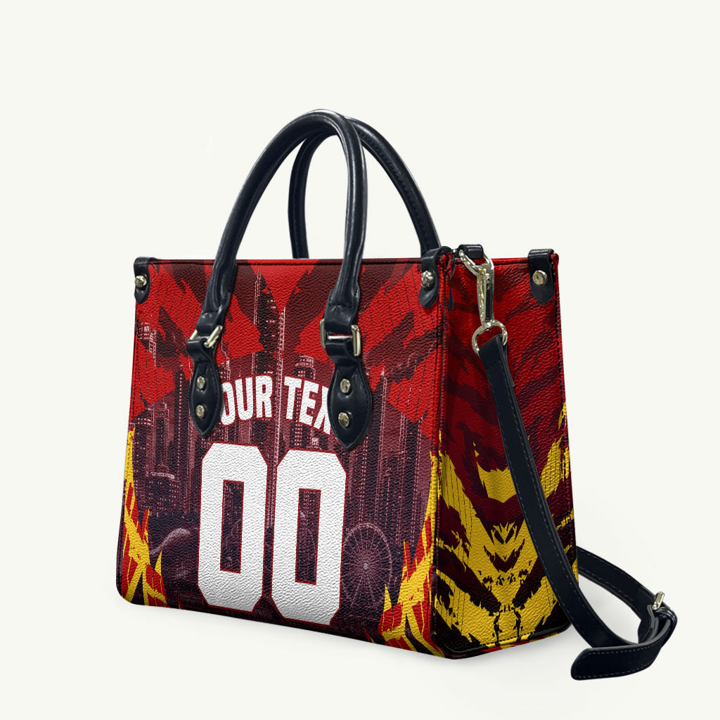 Personalised Gold Coast Suns Football Leather Bag Electric Red Flame Mascot Charging Cityscape