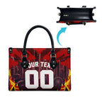 Personalised Gold Coast Suns Football Leather Bag Electric Red Flame Mascot Charging Cityscape