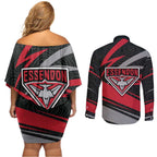 Essendon Bombers Australian Football Couples Matching Off Shoulder Short Dress and Long Sleeve Button Shirt Skeeta Mascot With Indigenous Pattern Art