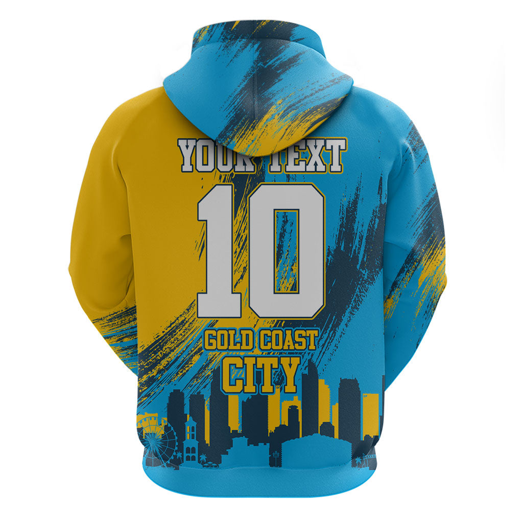Personalised Gold Coast Titans Rugby Hoodie Muscular Titan Mascot City Skyline Graphic