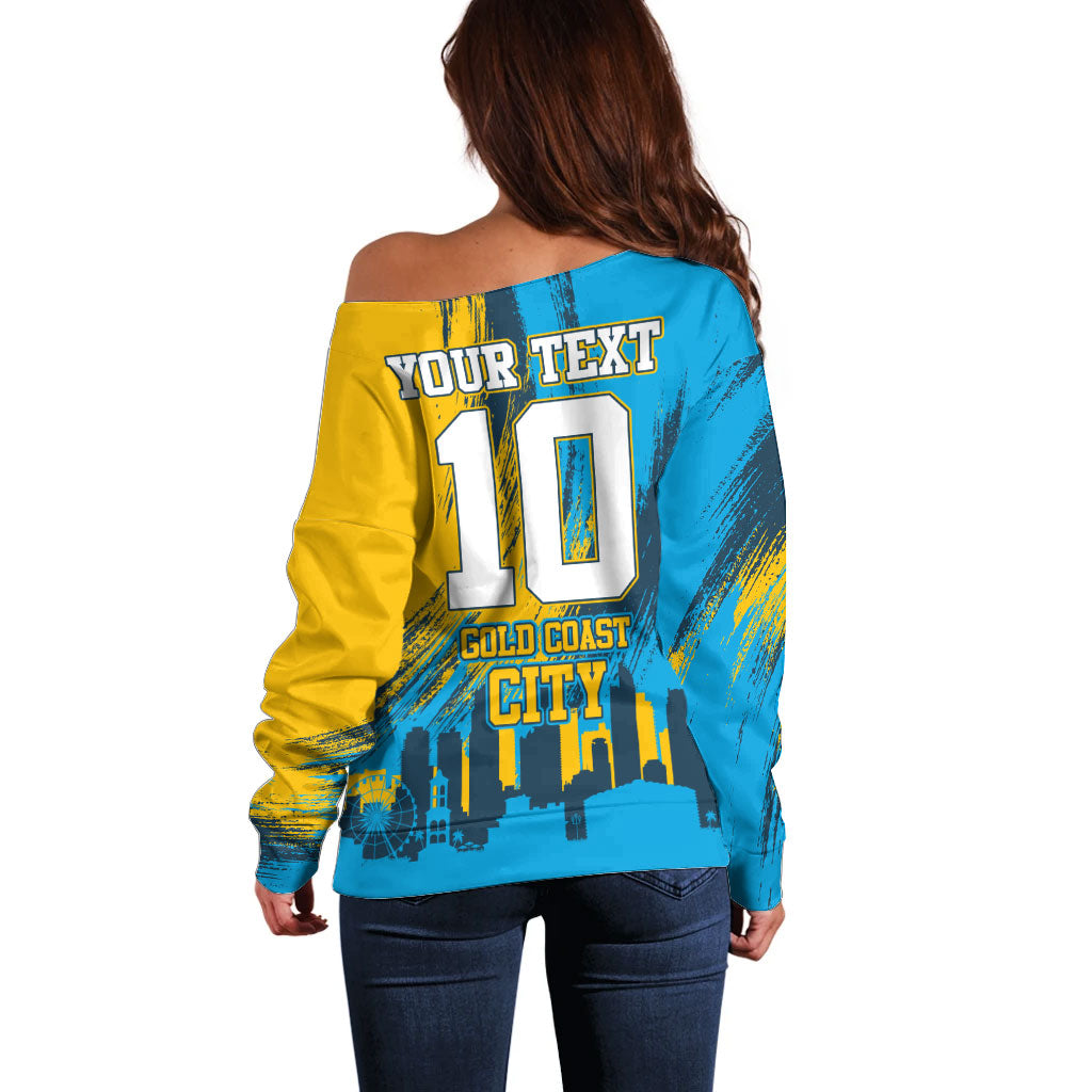 Personalised Gold Coast Titans Rugby Off Shoulder Sweater Muscular Titan Mascot City Skyline Graphic