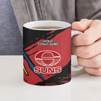 Gold Coast Suns Ceramic Mug Suns Muscular Mascot Graphic - Abstract Paint Splatter Art