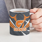 Greater Western Sydney Giants Australian Football Ceramic Mug Powerful Muscle Mascot With Geometric Sunburst Motion Art
