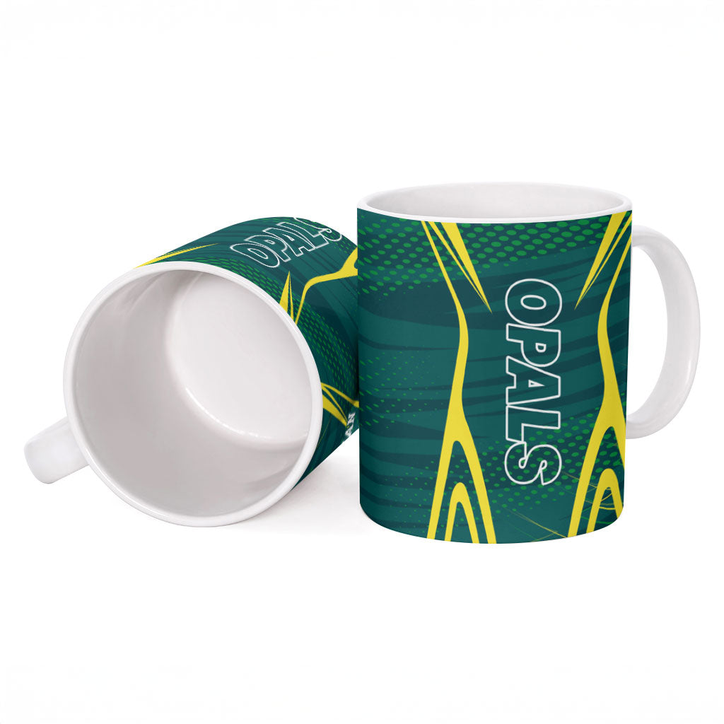 Australian Opals Basketball Ceramic Mug Iconic Green And Gold Silhouette With Sharp Abstract Graphics