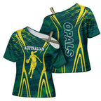 Australian Opals Basketball Cross Shoulder Shirt Iconic Green And Gold Silhouette With Sharp Abstract Graphics