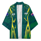 Australian Opals Basketball Kimono Iconic Green And Gold Silhouette With Sharp Abstract Graphics