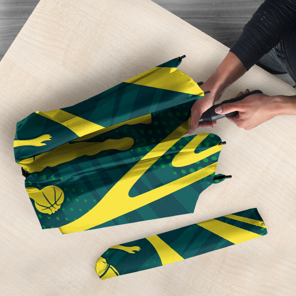 Australian Opals Basketball Umbrella Iconic Green And Gold Silhouette With Sharp Abstract Graphics