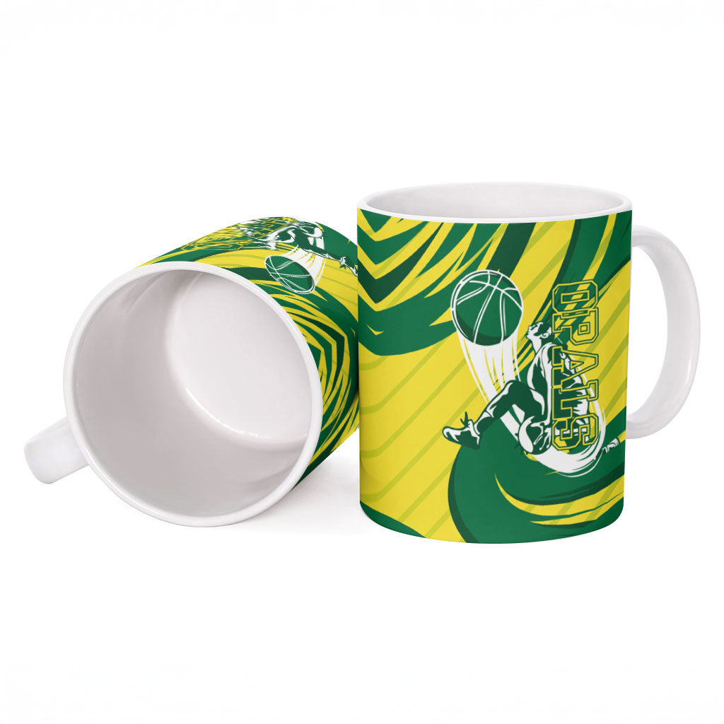 Australian Opals Basketball Ceramic Mug Green and Gold Tribal Pattern Athletic Abstract Art