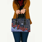 North Melbourne Kangaroos ANZAC Day Leather Bag Indigenous Dot Art with Poppy Flower Tribute