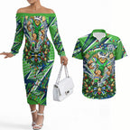 Personalized Canberra Raiders Rugby Christmas Couples Matching Off The Shoulder Long Sleeve Dress and Hawaiian Shirt Holiday Mascot Graphic Art Festive Lights Bow