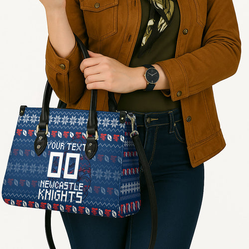 Personalized Newcastle Knights Christmas Leather Bag Australian Rugby Fans - Pixelated Ugly Xmas Pattern Mascot Santa