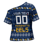 Personalized Parramatta Eels Christmas Cross Shoulder Shirt Australian Rugby Fans - Pixelated Ugly Xmas Pattern Mascot Santa