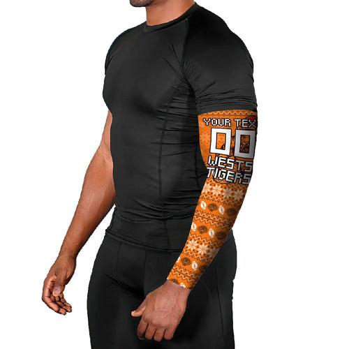 Personalized Wests Tigers Christmas Arm Sleeves Australian Rugby Fans - Pixelated Ugly Xmas Pattern Mascot Santa