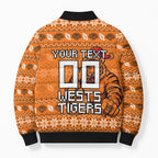 Personalized Wests Tigers Christmas Bomber Puffer Jacket Australian Rugby Fans - Pixelated Ugly Xmas Pattern Mascot Santa