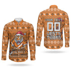 Personalized Wests Tigers Christmas Couples Matching Puletasi and Long Sleeve Button Shirt Australian Rugby Fans - Pixelated Ugly Xmas Pattern Mascot Santa