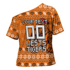 Personalized Wests Tigers Christmas Cross Shoulder Shirt Australian Rugby Fans - Pixelated Ugly Xmas Pattern Mascot Santa