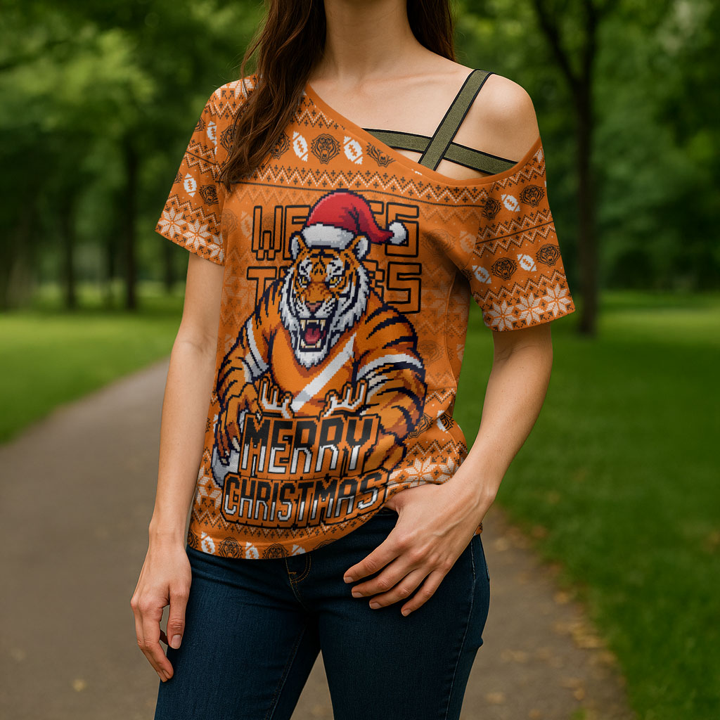Personalized Wests Tigers Christmas Cross Shoulder Shirt Australian Rugby Fans - Pixelated Ugly Xmas Pattern Mascot Santa