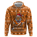Personalized Wests Tigers Christmas Hoodie Australian Rugby Fans - Pixelated Ugly Xmas Pattern Mascot Santa