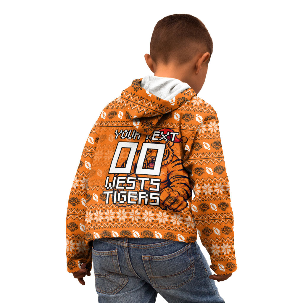 Personalized Wests Tigers Christmas Kid Hoodie Australian Rugby Fans - Pixelated Ugly Xmas Pattern Mascot Santa