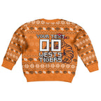 Personalized Wests Tigers Christmas Kid Ugly Christmas Sweater Australian Rugby Fans - Pixelated Ugly Xmas Pattern Mascot Santa