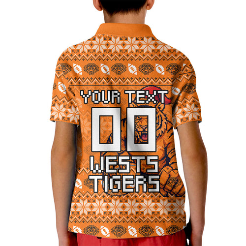 Personalized Wests Tigers Christmas Kid Polo Shirt Australian Rugby Fans - Pixelated Ugly Xmas Pattern Mascot Santa