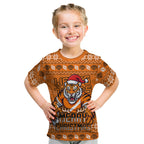 Personalized Wests Tigers Christmas Kid T Shirt Australian Rugby Fans - Pixelated Ugly Xmas Pattern Mascot Santa
