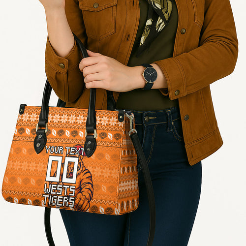 Personalized Wests Tigers Christmas Leather Bag Australian Rugby Fans - Pixelated Ugly Xmas Pattern Mascot Santa