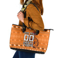 Personalized Wests Tigers Christmas Leather Tote Bag Australian Rugby Fans - Pixelated Ugly Xmas Pattern Mascot Santa