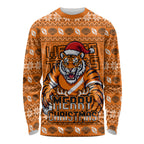 Personalized Wests Tigers Christmas Long Sleeve Shirt Australian Rugby Fans - Pixelated Ugly Xmas Pattern Mascot Santa