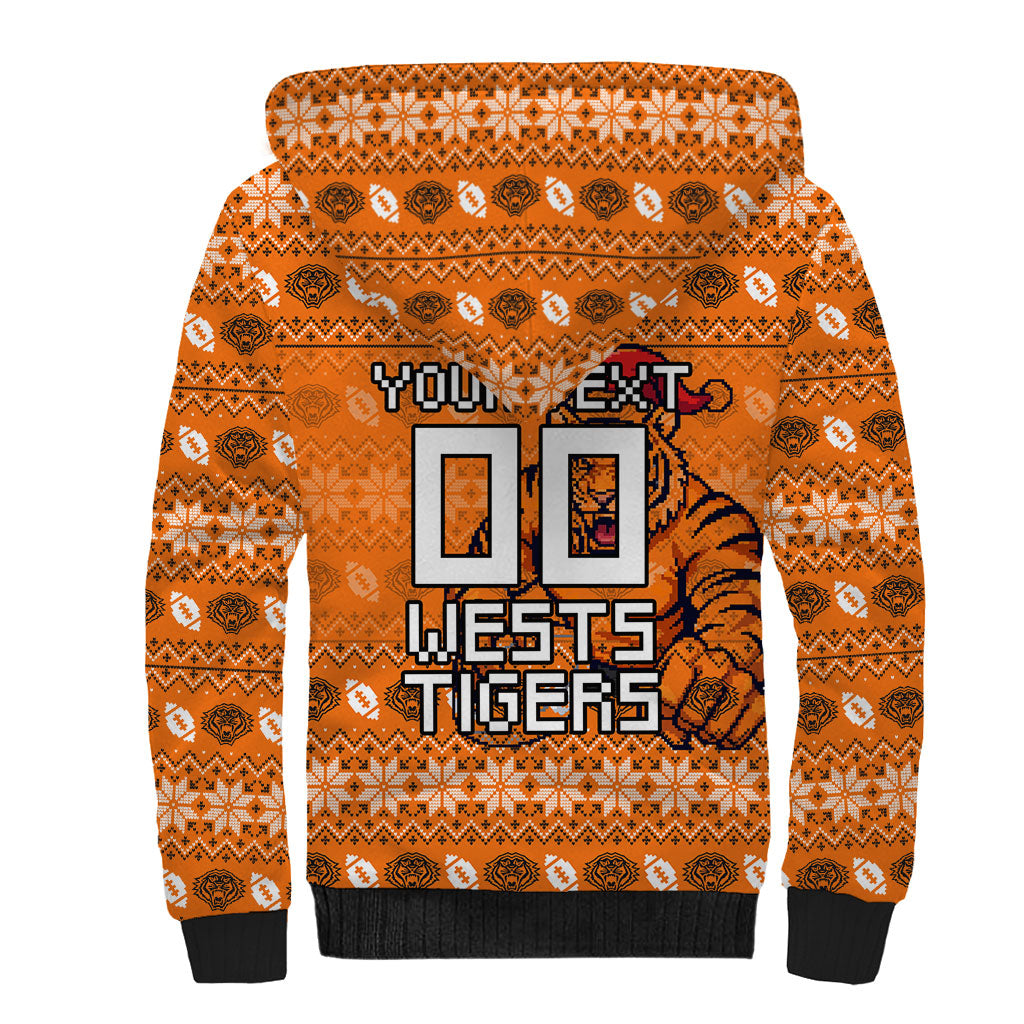 Personalized Wests Tigers Christmas Sherpa Hoodie Australian Rugby Fans - Pixelated Ugly Xmas Pattern Mascot Santa