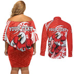 Personalized Sydney Swans Couples Matching Off Shoulder Short Dress and Long Sleeve Button Shirt Polynesian Tribal Swan Mascot With Hibiscus Floral Art