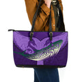 maori-manaia-whales-gods-of-the-sea-leather-tote-bag-purple