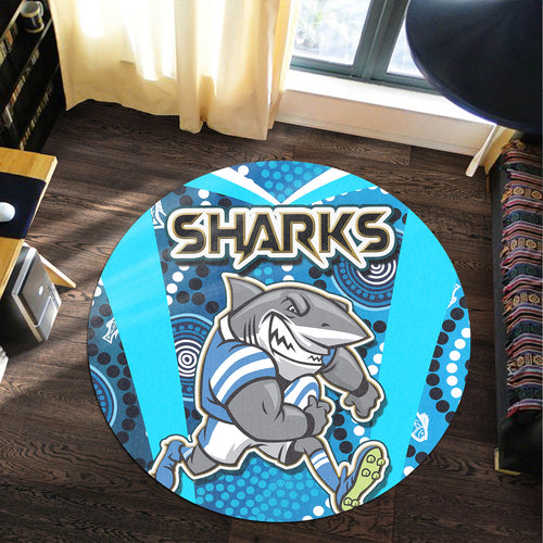sharks-rugby-round-rug-sharks-with-rugby-ball-and-aboriginal-dot-design-blue-background-round-rug