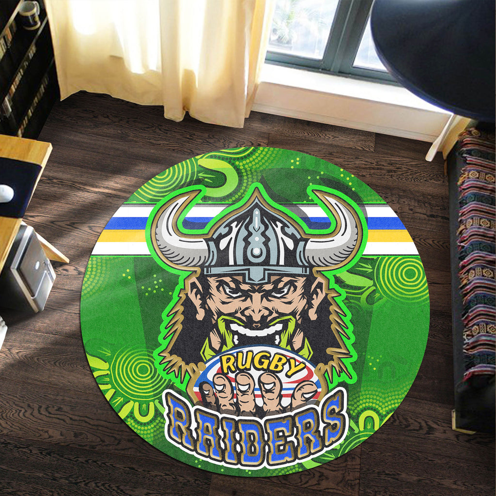 raiders-rugby-round-rug-raiders-holding-ball-in-hand-with-dot-art-aboriginal-background-round-rug