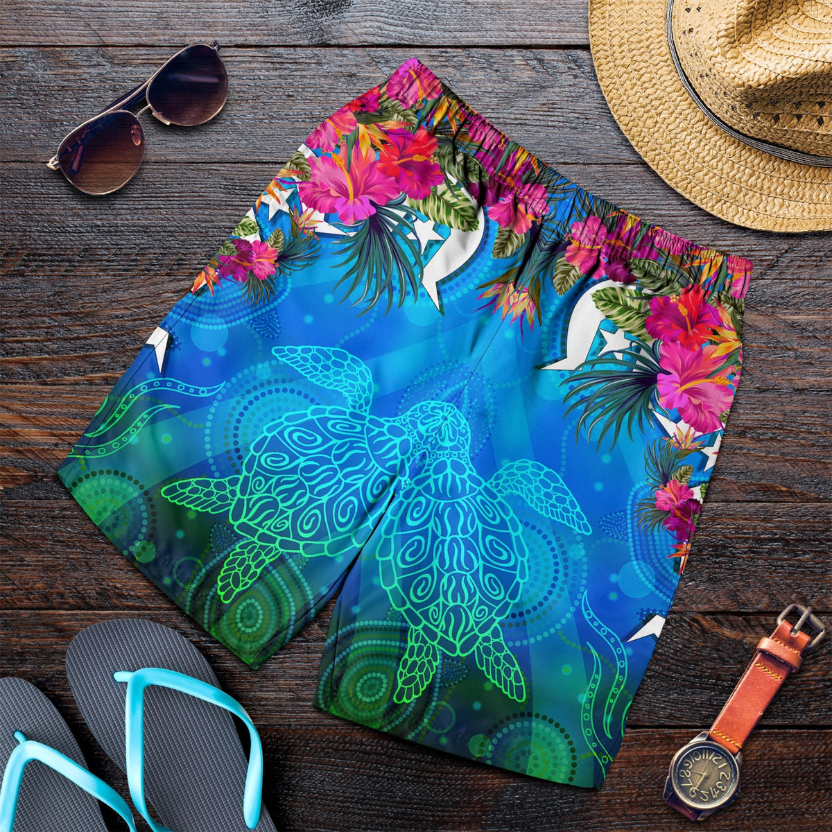 men-short-torres-strait-blue-sea-with-hibiscus