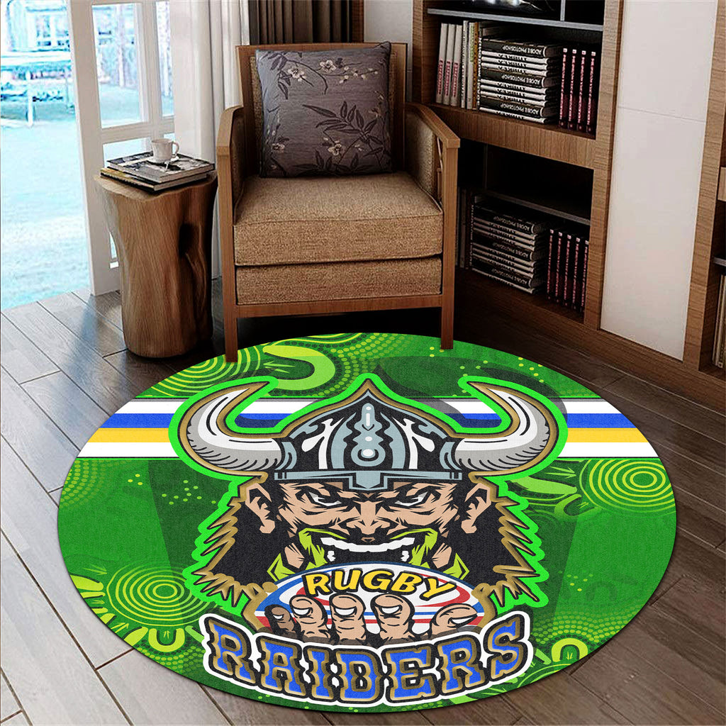 raiders-rugby-round-rug-raiders-holding-ball-in-hand-with-dot-art-aboriginal-background-round-rug