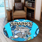 sharks-rugby-round-rug-sharks-with-rugby-ball-and-aboriginal-dot-design-blue-background-round-rug