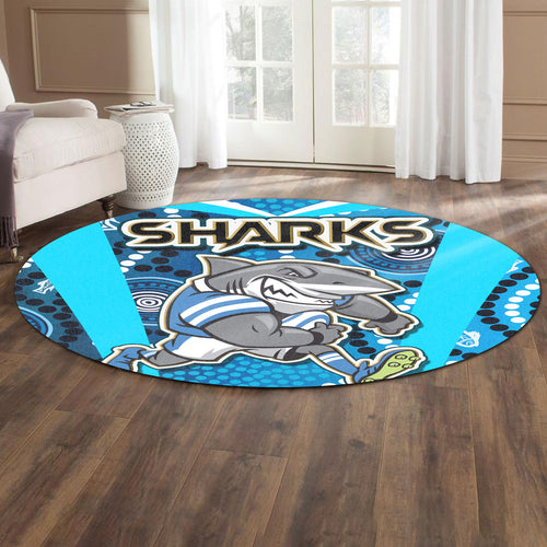 sharks-rugby-round-rug-sharks-with-rugby-ball-and-aboriginal-dot-design-blue-background-round-rug