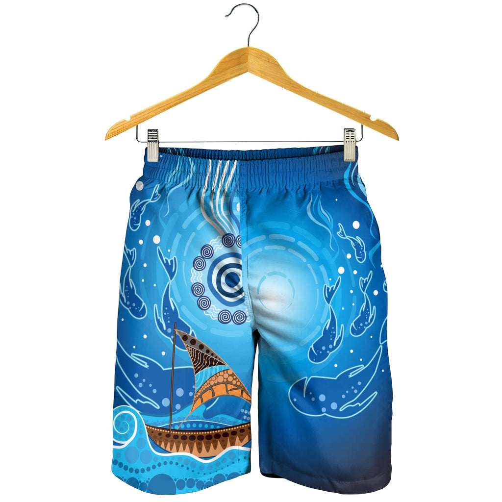 men-short-aboriginal-view-sea-with-fish-and-boat