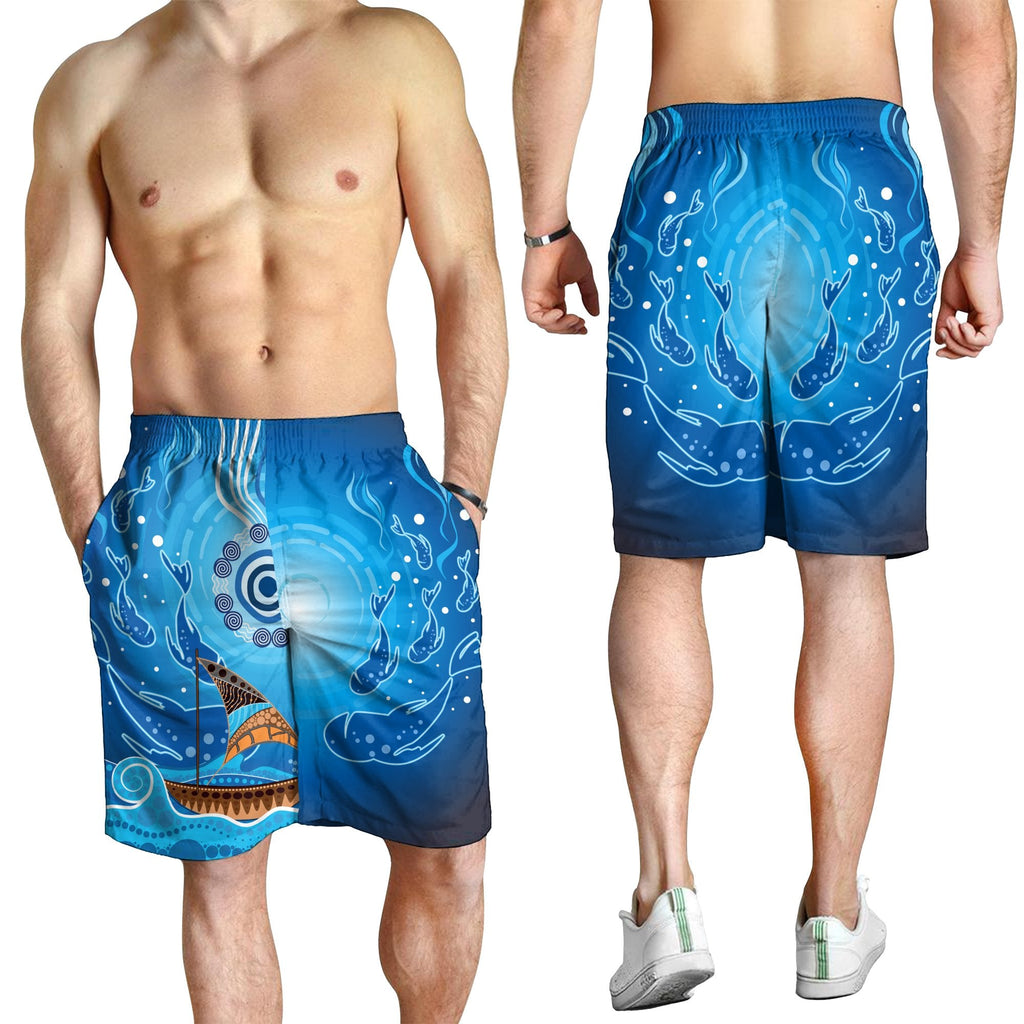 men-short-aboriginal-view-sea-with-fish-and-boat