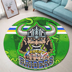 raiders-rugby-round-rug-raiders-holding-ball-in-hand-with-dot-art-aboriginal-background-round-rug