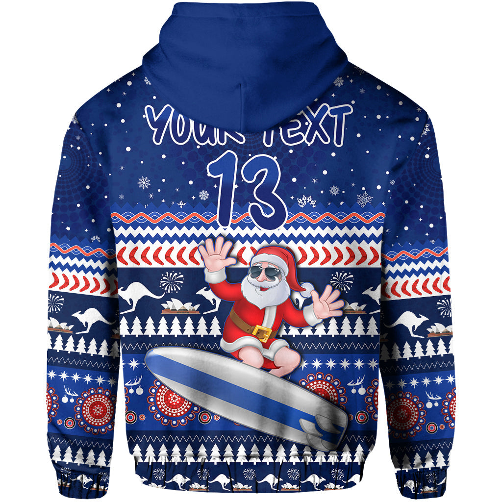 custom-text-and-number-australia-christmas-hoodie-aussie-aboriginal-santa-claus-is-surfing-with-kangaroo