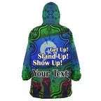 naidoc-week-2023-wearable-blanket-hoodie-custom-black-raised-hands-with-aboriginal-inspired-patterns-wearable-blanket-hoodie