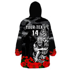 custom-text-and-number-warriors-anzac-2023-wearable-blanket-hoodie-nz-fern-camouflage-poppy-mix-aboriginal